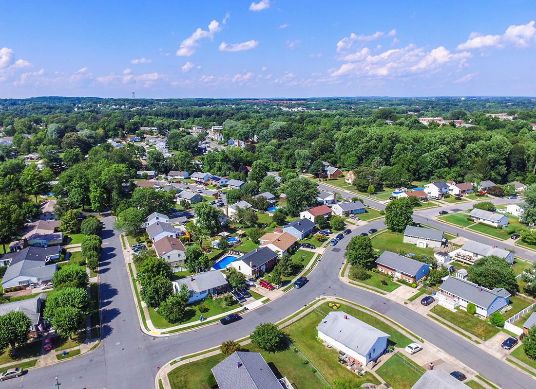 Easton, MD - Aerial View of Suburban Homes With Green Trees on a Sunny Day